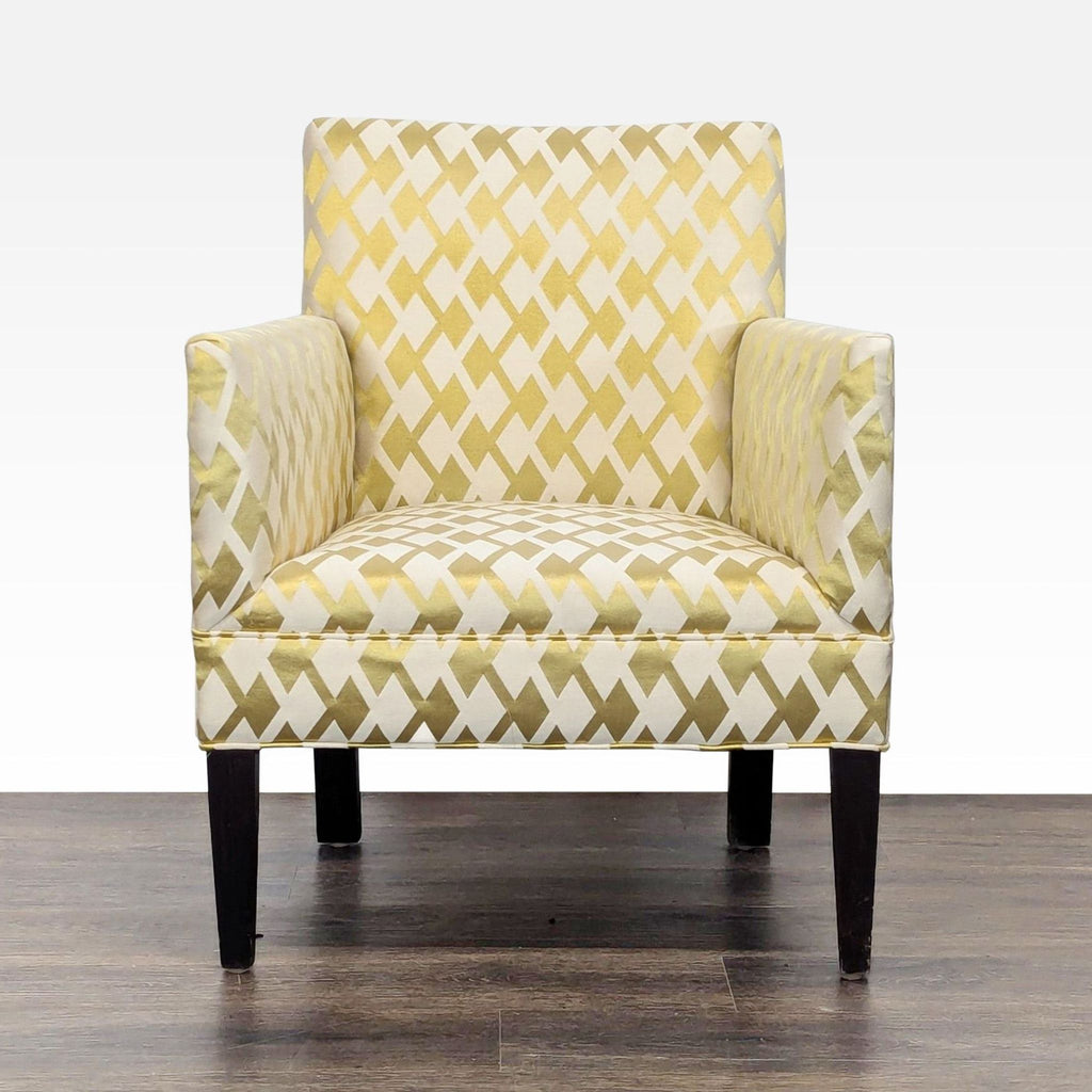 Lounge chair by Lee Industries with gold and cream diamond upholstery, dark wood legs, and armrests.