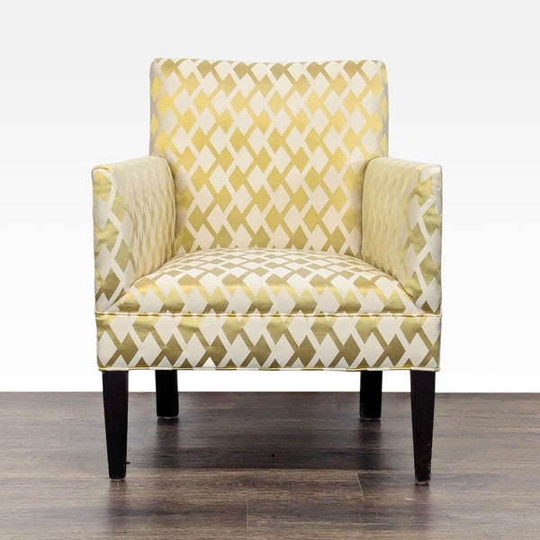 Front view of a Lee Industries lounge chair with gold and cream diamond pattern and dark wooden legs.
