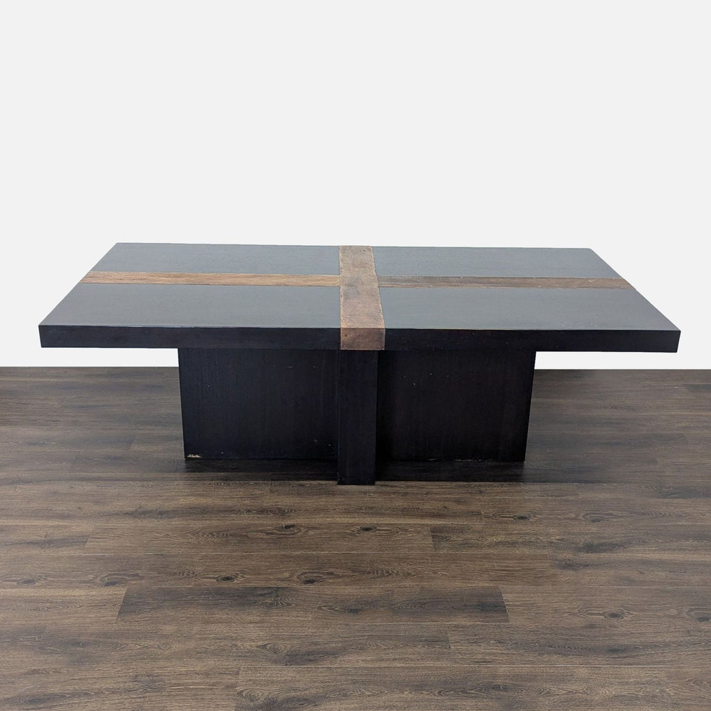 1. Rectangular Reperch dining table with a dark finish and a lighter wood cross design on the tabletop.