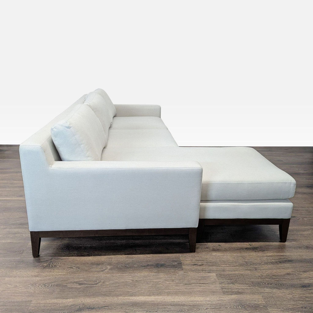 Modern Poly & Bark fabric sectional featuring a left-side chaise and wooden legs, perfect for spacious living rooms.
