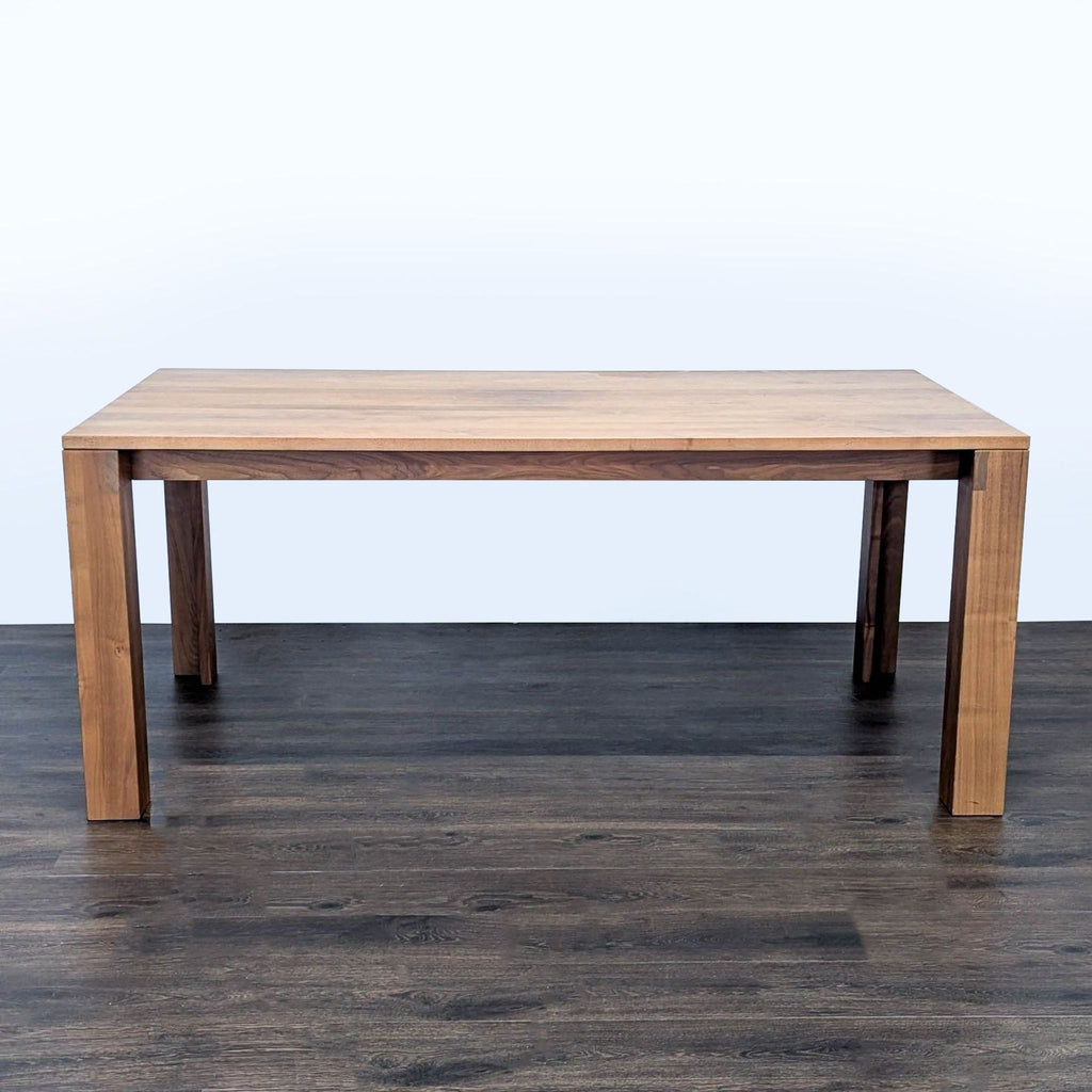 1. Rectangular walnut dining table with clean, minimalist lines from Design Within Reach, inspired by Parsons Table.