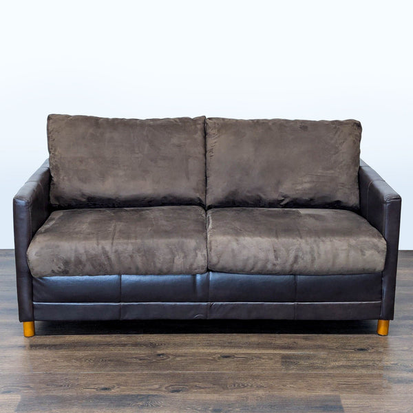 1. Front view of a Reperch Sleeper Sofa with plush brown cushions and dark arms on wooden legs.