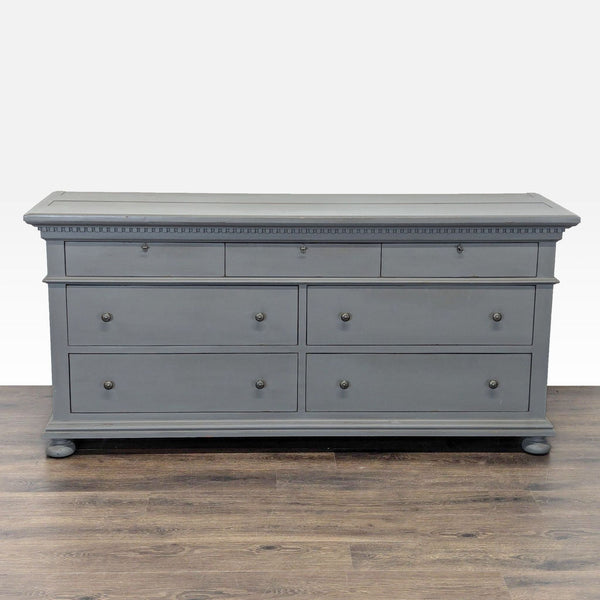 Restoration Hardware gray dresser with seven drawers and a classic, sturdy design for bedroom storage.