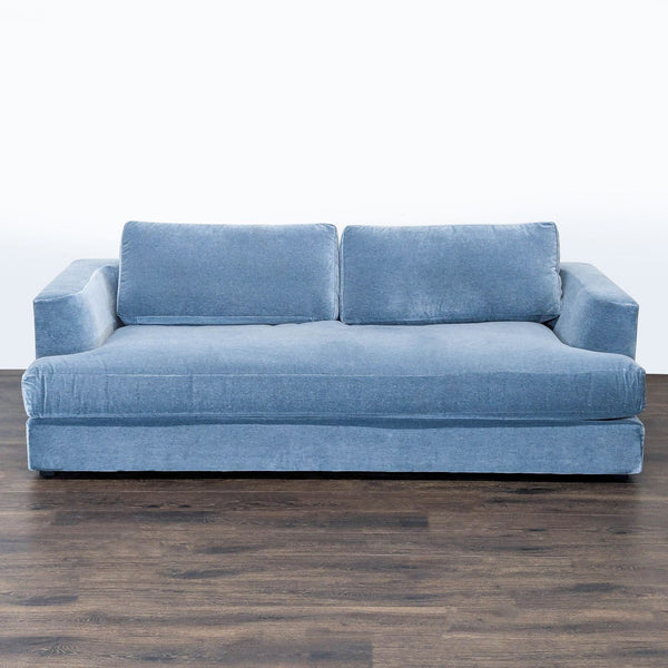 1. Front view of a blue Maiden Home 3-seat sofa with plush cushions on a dark wood floor.