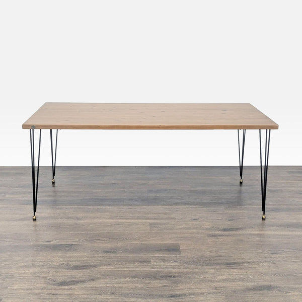 1. Urban Wood Goods dining table with a rectangular wood top and minimalist black hairpin legs, viewed from the front.