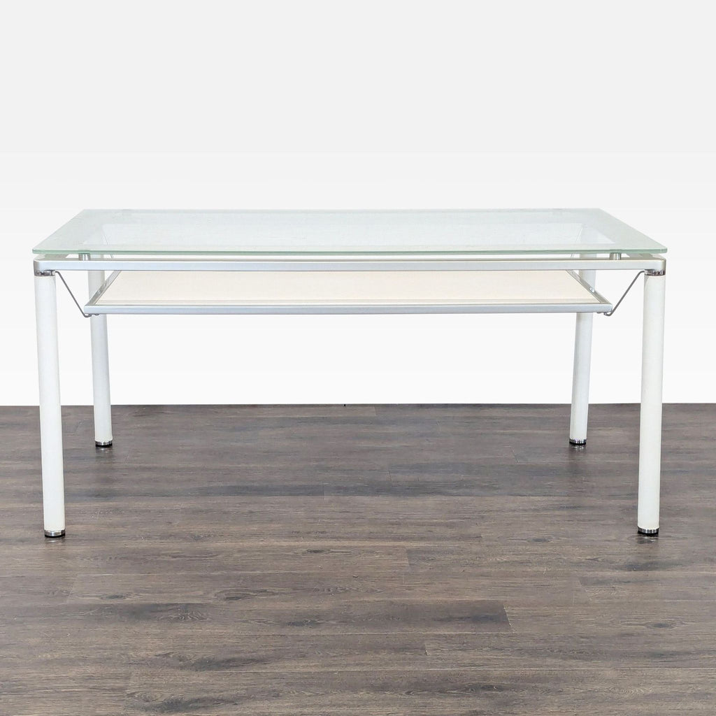 Sleek dining set featuring a clear glass table and comfortable blue chairs with shiny chrome bases.