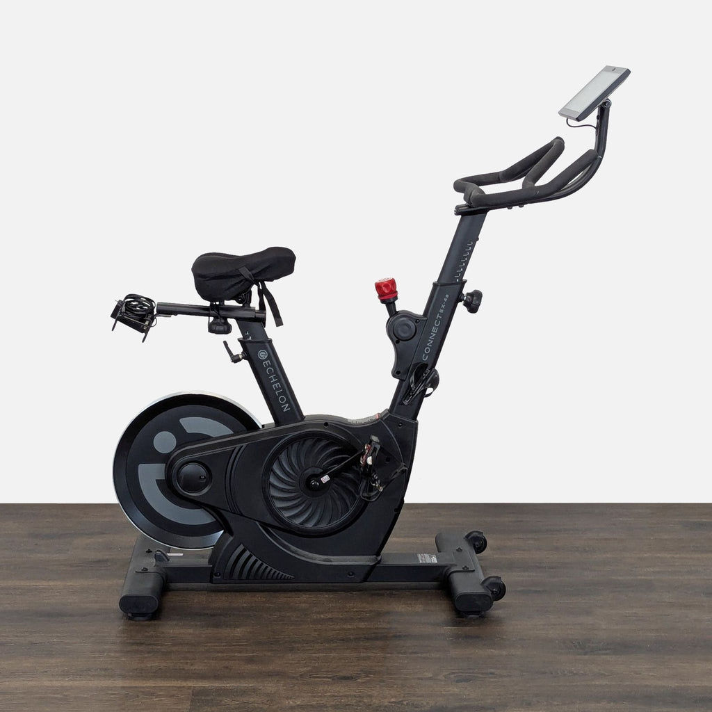 Echelon Connect smart exercise bike with touchscreen, adjustable seat, and sturdy frame for interactive workouts.