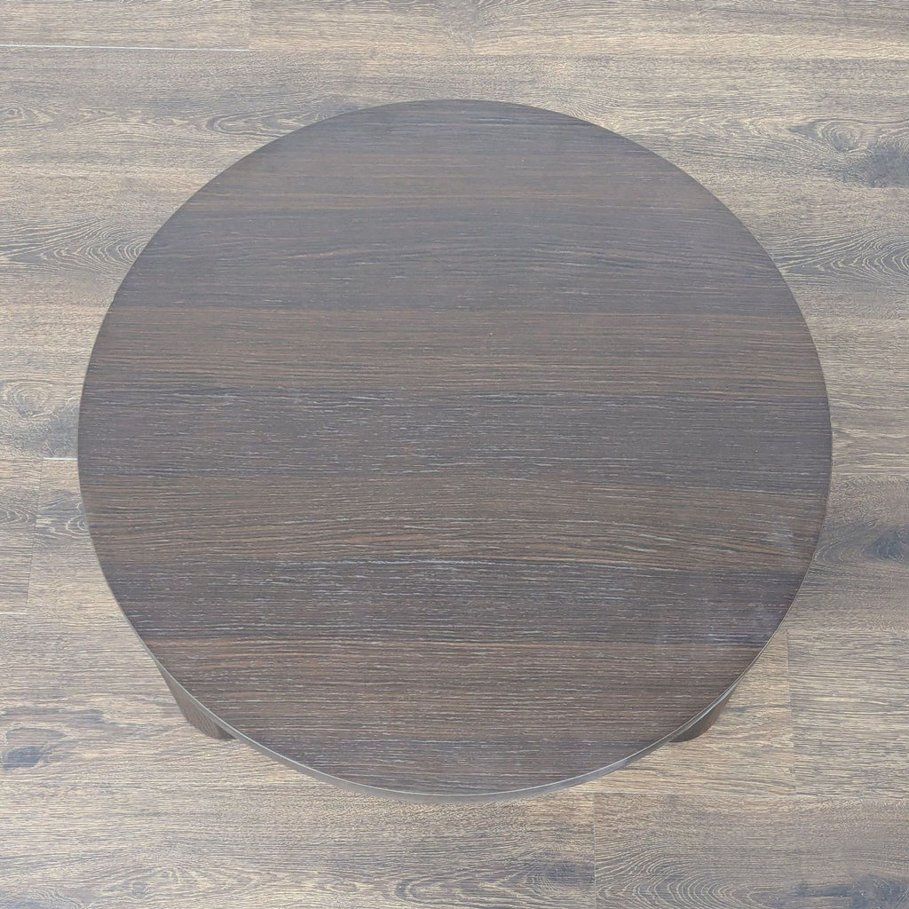 Italian-style Ferm Living coffee table features a striking striped marquetry top and bold, sculptural base.