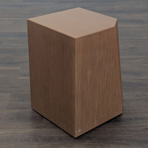 1. Embossed wood side table by Coalesse, with geometric shape and textured surface designed by Norman Deikman.
