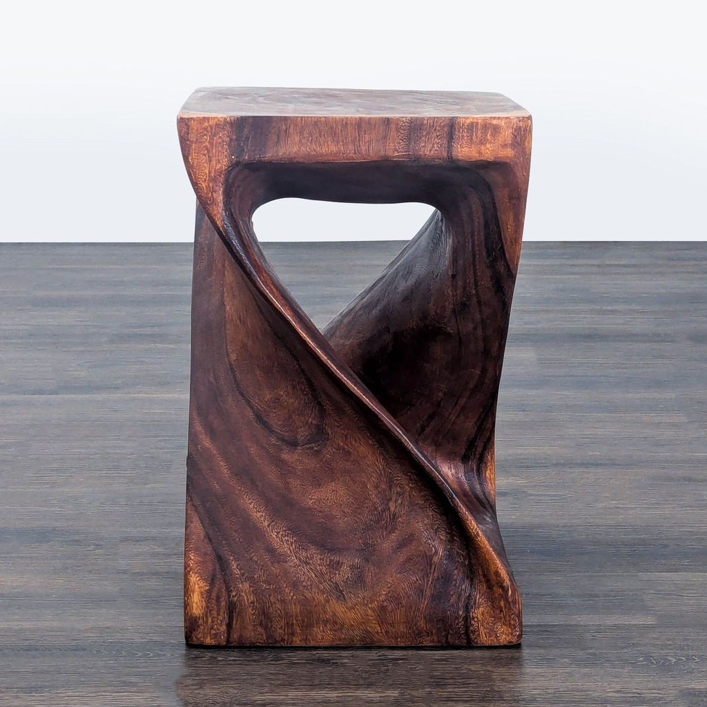 2. Contemporary side or console table featuring a unique spiral silhouette and natural wood finish.
