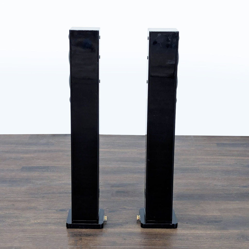 Back view of Monitor Audio floorstanding speakers in good condition, suitable for any audio setup.