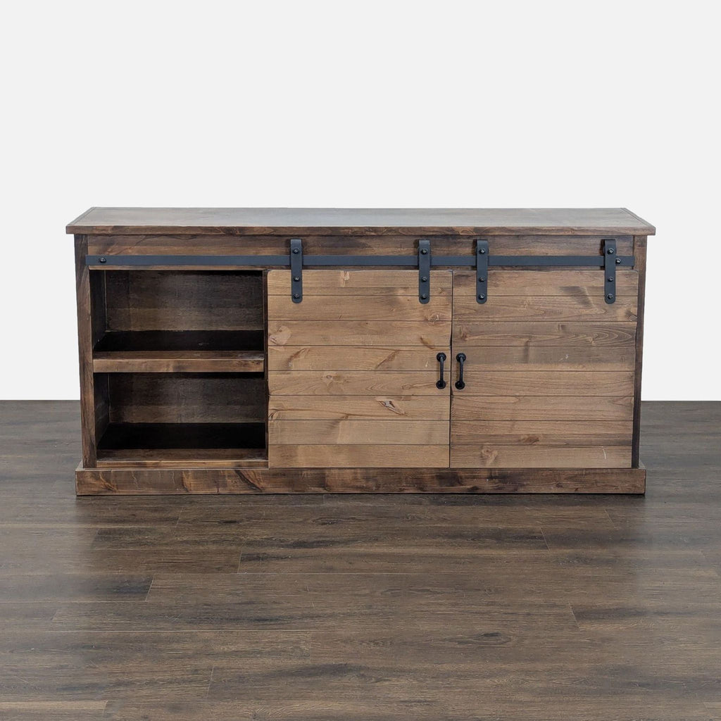 Farmhouse-style entertainment center with sliding barn doors, aged whiskey finish, from Legends Furniture.  