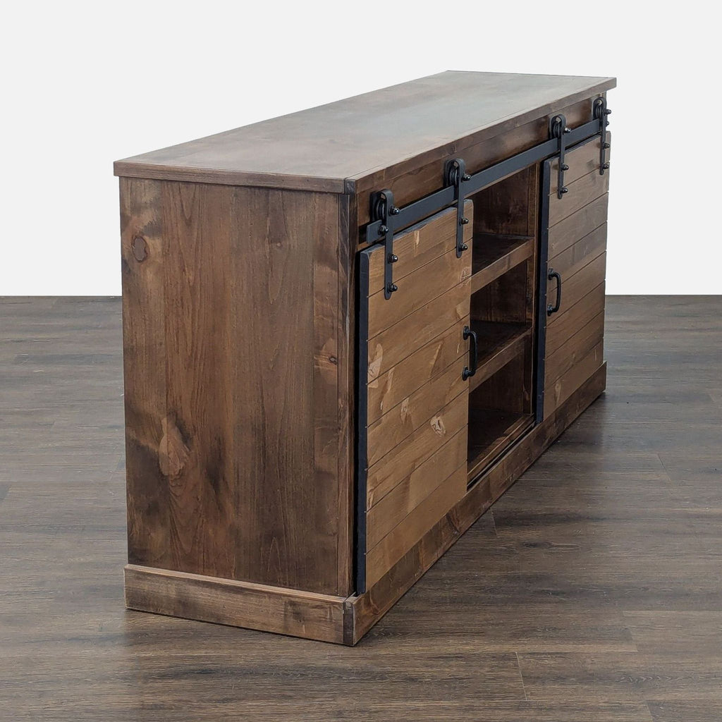 Legends Furniture entertainment center featuring wood construction and rustic sliding doors in whiskey finish.