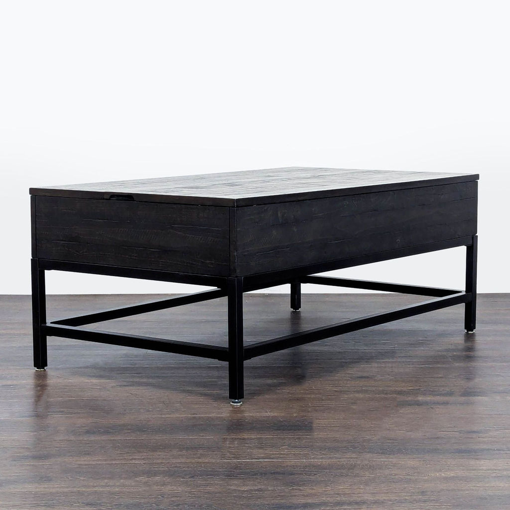 3. Angled view of a modern Living Spaces coffee table with a dark wood finish and black metal base.