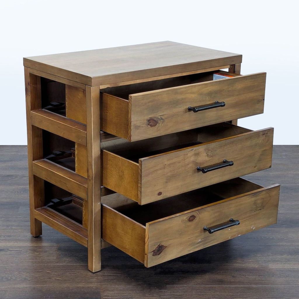Deconstructed pine end table by Magnolia Home featuring visible side drawers and sturdy pine veneers.  