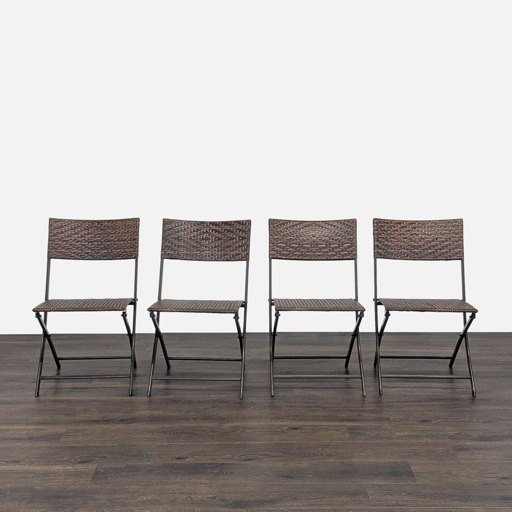 Compact rattan-look table and chair set, foldable for easy storage; perfect for small spaces and quick setup.