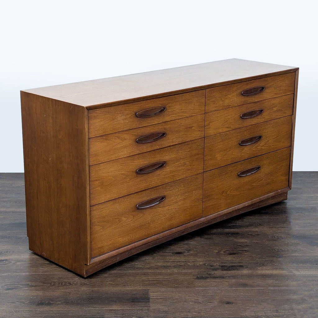 Vintage Henredon dresser with sturdy build, eight easy-glide drawers, and elegant mid-century design.