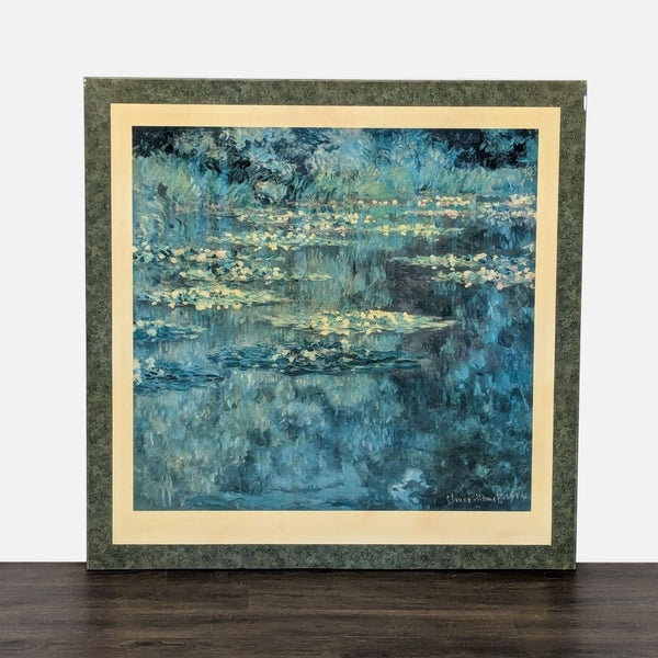 Framed art print of Monet's "Water Lilies" in blue-green tones, set in a green textured frame.