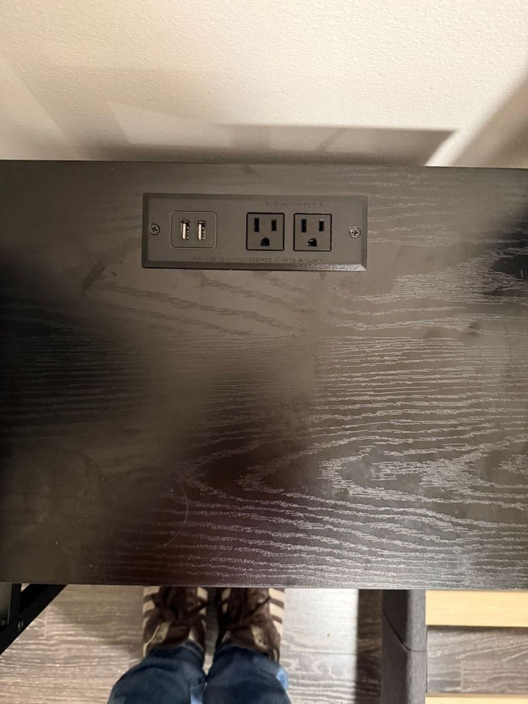 2. Top view of Yoobure Home end table, showing built-in power outlets and USB ports on the surface.