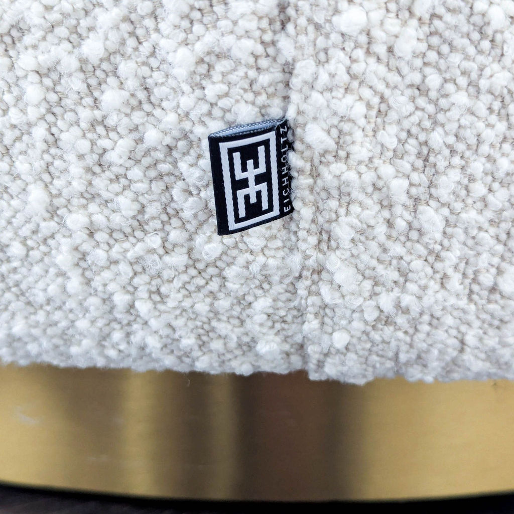 Eichholtz Brice White Bouclé Swivel Chair with Brass Base