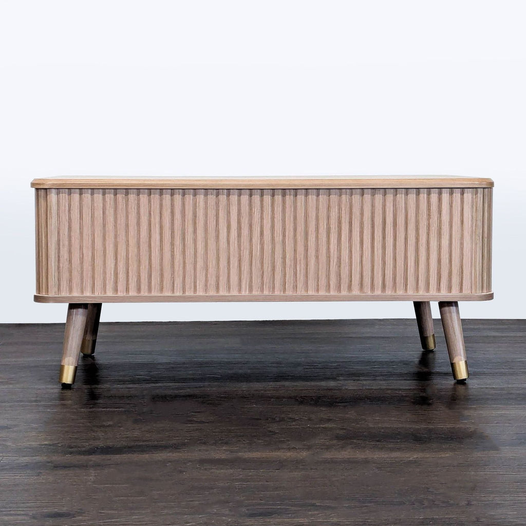 Oak finish mid-century coffee table by Joinice with distinctive fluted wood accents.
