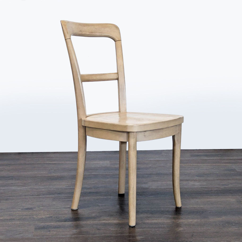 Seadrift-finished rubberwood dining chair from Pottery Barn.