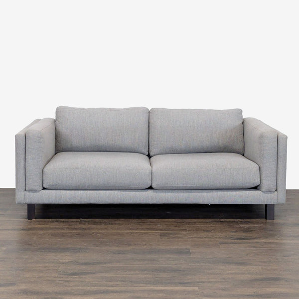 Modern Room and Board loveseat with soft gray upholstery and clean lines, perfect for stylish living spaces.  