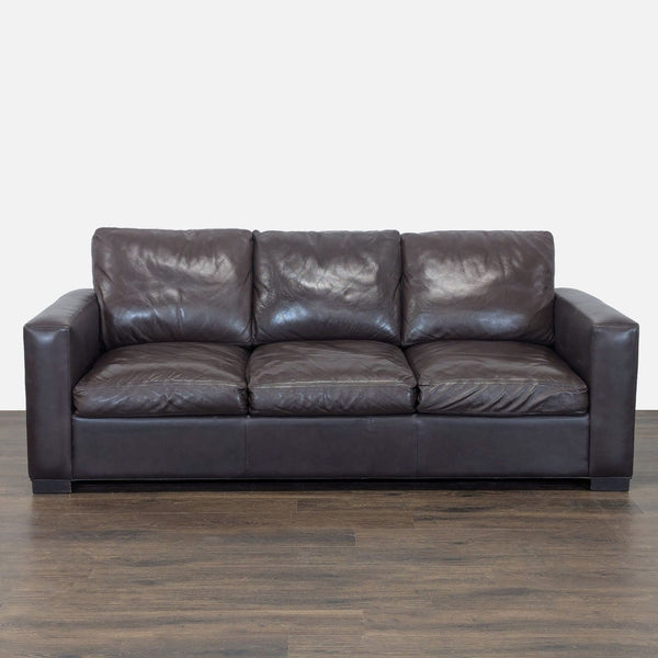 Room and Board dark brown leather sleeper sofa with seating for three and a clean, classic design.
