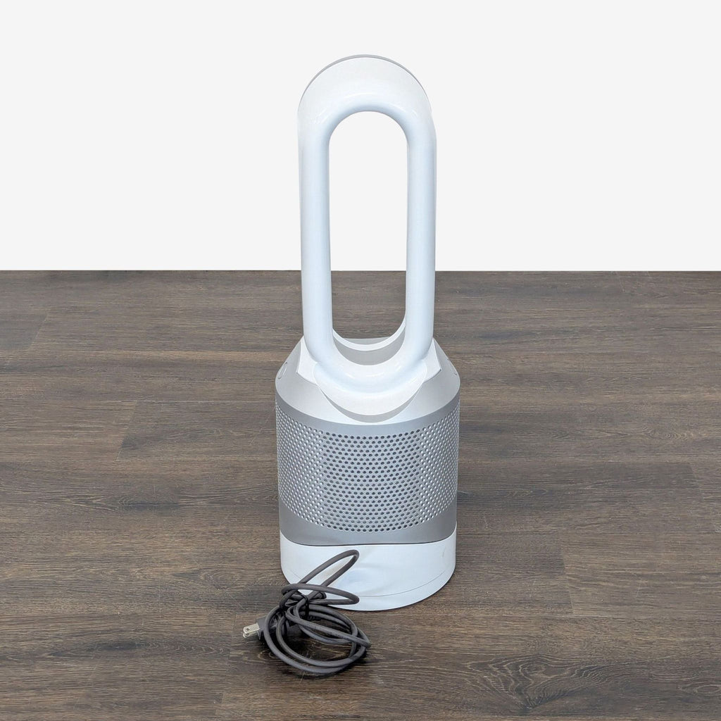 Dyson heater and air purifier with bladeless design, compact for small rooms, displayed on a neutral background.  