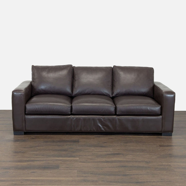 Room & Board sleeper sofa in brown leather with modern design, easily converts to a comfortable pull-out bed.