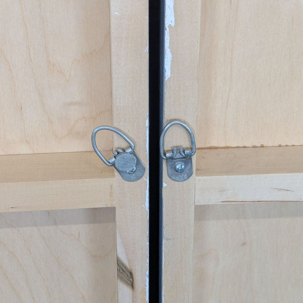 Abstract painting of vertical tree forms on joined wood panels with a blue background, by artist Janine Brown.