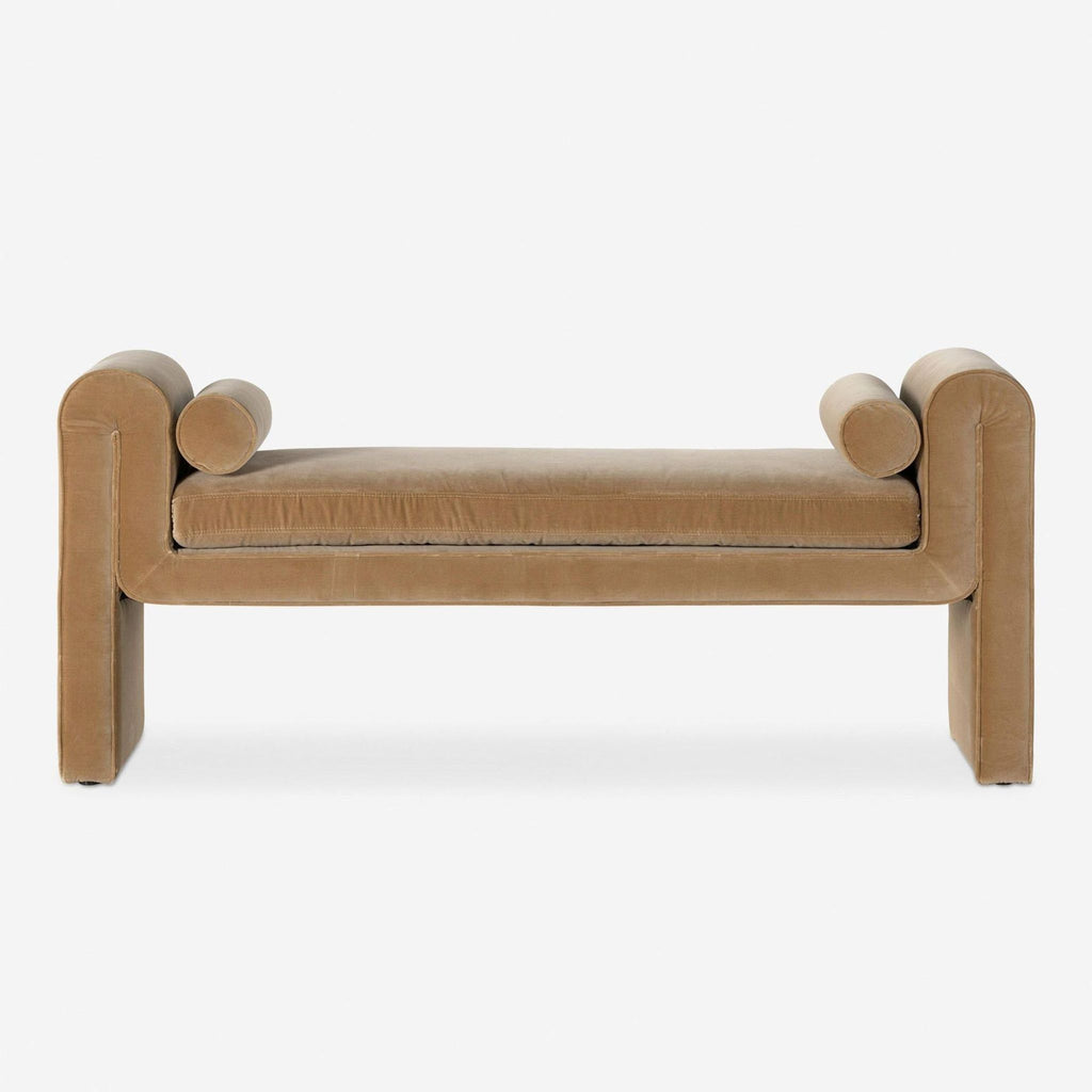 Buff velvet bench with rounded edges and cylindrical cushions from Lulu and Georgia, styled with linear details.