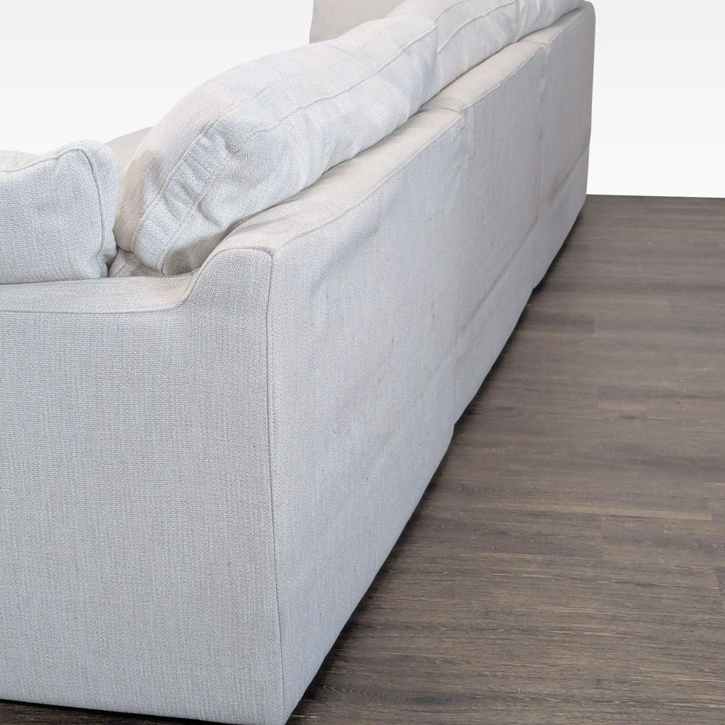 Fabric-upholstered sectional from Restoration Hardware; includes a large chaise and plush seating for comfort.