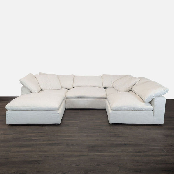 Restoration Hardware white modular sectional with plush seats, modern style, and ample space for large living rooms.  