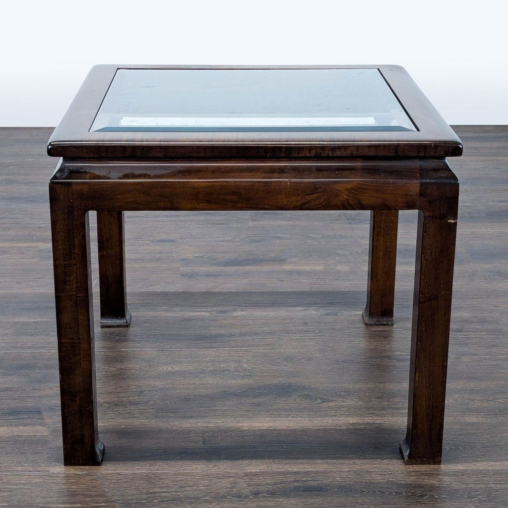 Square Drexel end table featuring a glass top and simple, clean lines with a dark wood finish, viewed from the front.