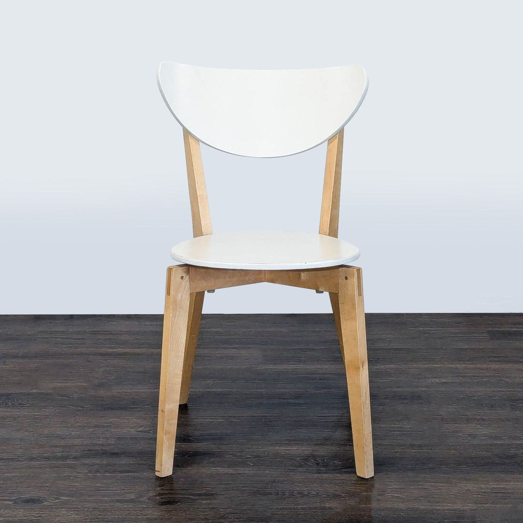 Ikea chair with a white seat and wood legs, displaying a modern minimalist style for various rooms.  