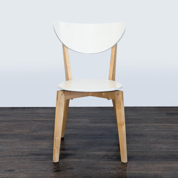 Ikea chair with a white seat and wood legs, displaying a modern minimalist style for various rooms.  