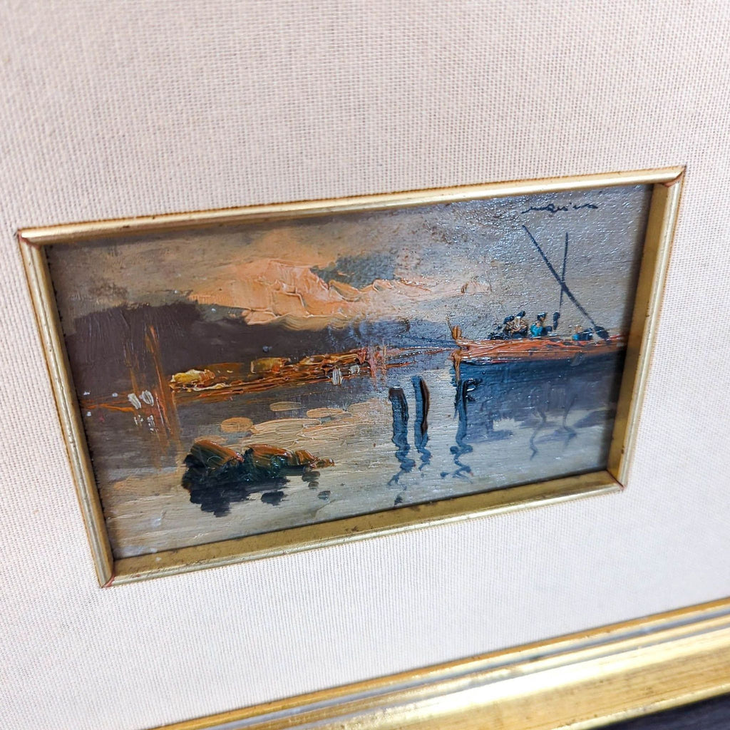 Sunset harbor scene in oil on canvas, showing a boat on reflective water, displayed in a gold frame.