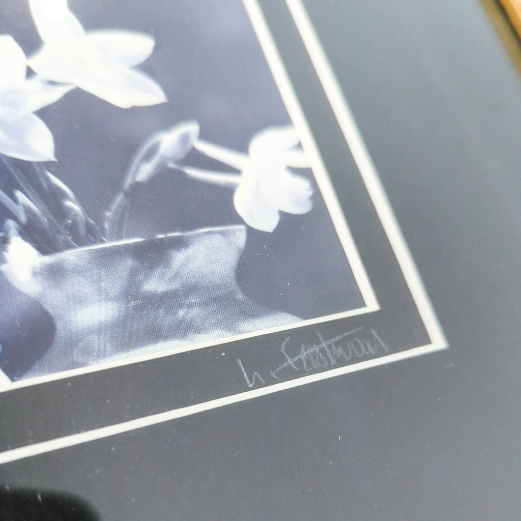 Black and white floral art print in ornate gold frame; signed by artist, ideal for classic décor.
