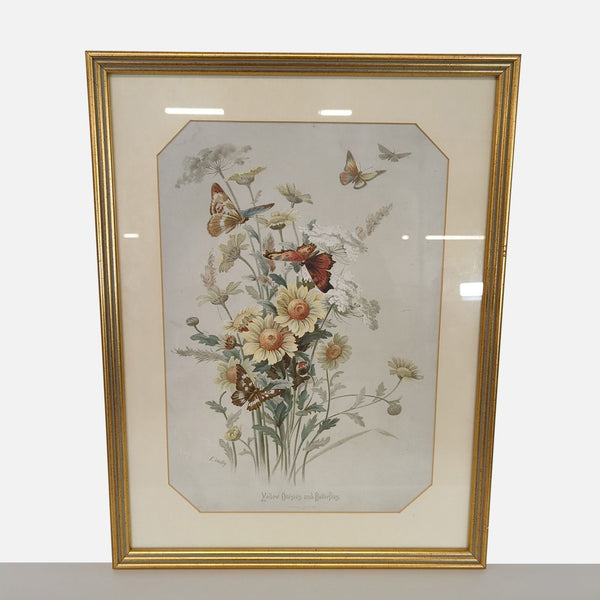 Framed illustration of yellow daisies and butterflies in a gold frame with a cream mat, vintage style print.
