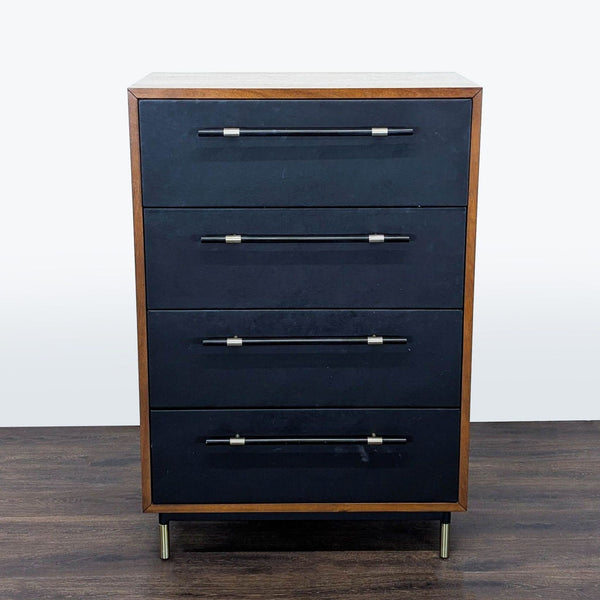 CB2 dresser with four drawers, black faux leather fronts, brass-accented handles, and rich wood frame.