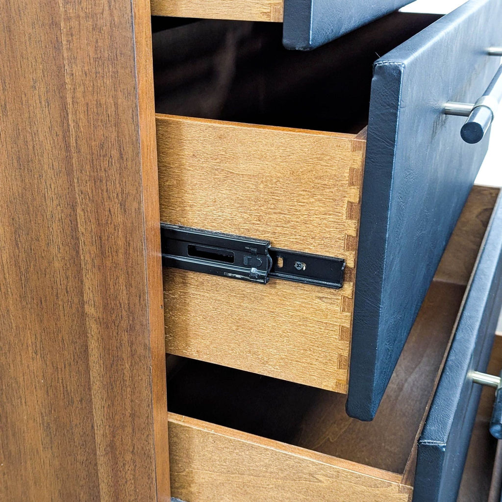 CB2 Oberlin Modern 4-Drawer Wood Dresser with Black Fronts and Brass Accents