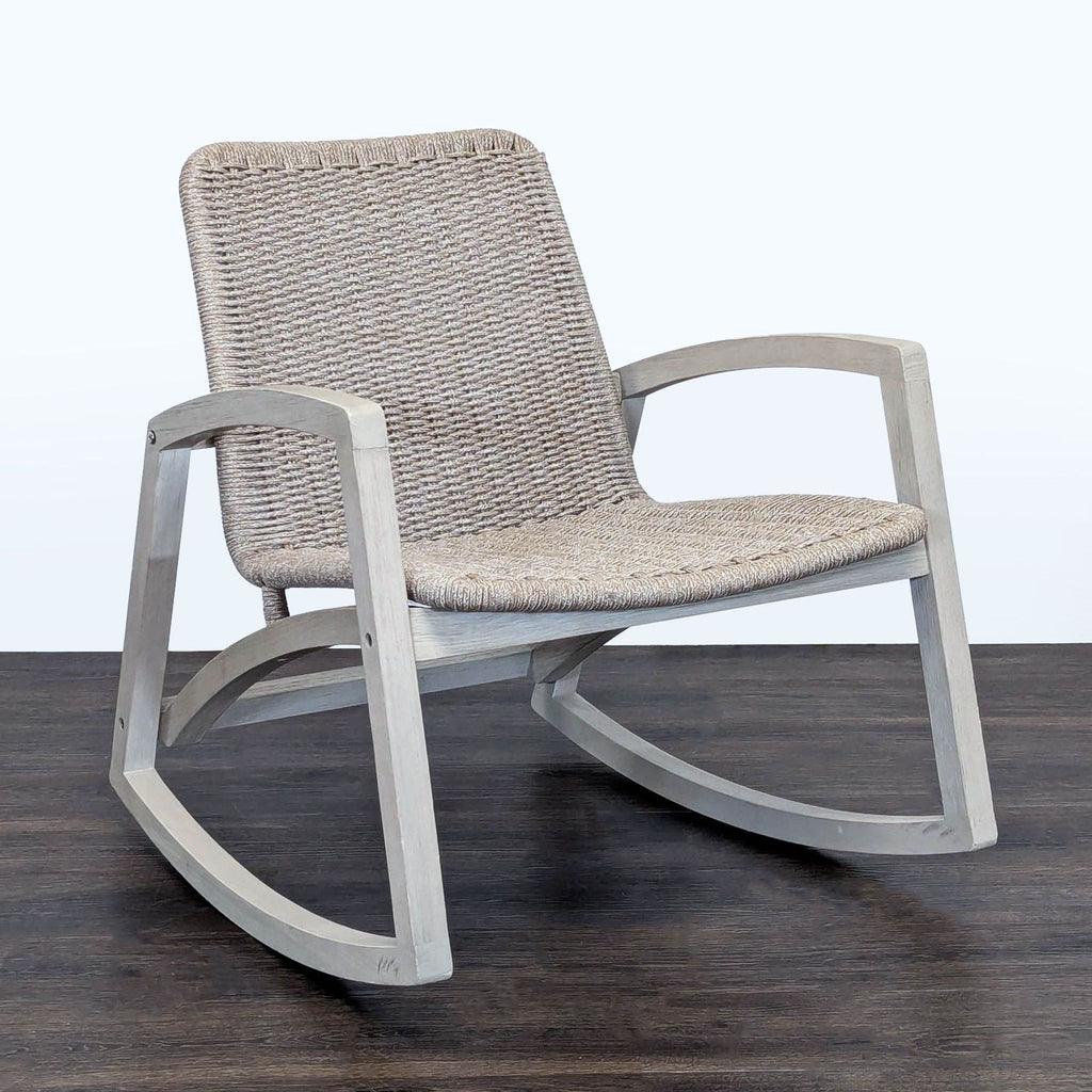 3. Article brand rocking chair: light wooden frame, comfortable woven seat, ideal for relaxing in your lounge.