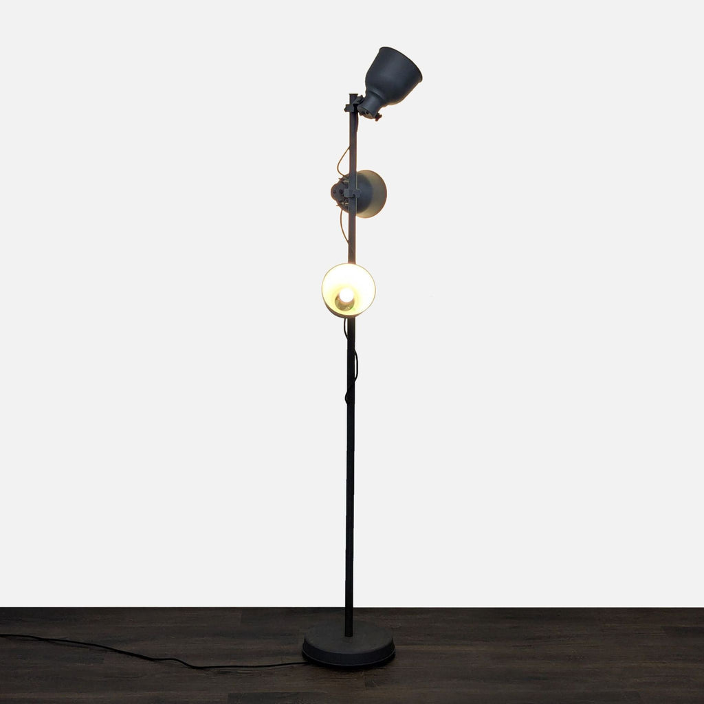 Modern Ikea lighting: floor lamp with three movable heads and stable base, fitting any contemporary décor.