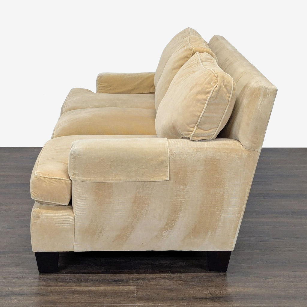 Front view of a Baker honey gold 3-seat corduroy couch with plush down cushions, in good condition.  