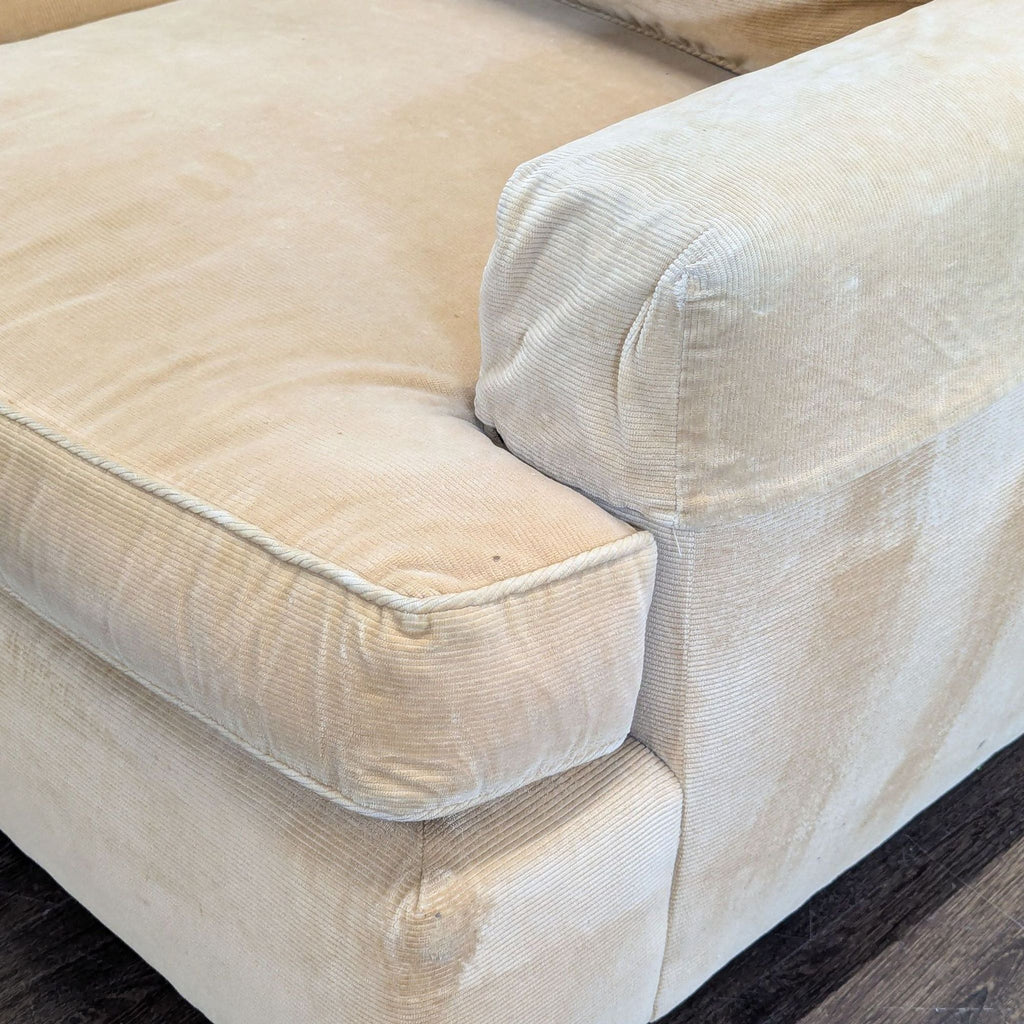 Three-seat Baker brand couch in corduroy fabric, front angle, honey gold color, down cushions, well-maintained.  