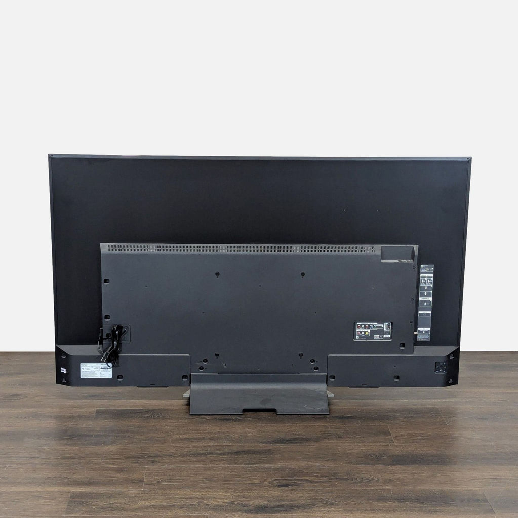 Sony 65" LED television featuring a vibrant display, elegant look, and excellent condition for entertainment spaces.