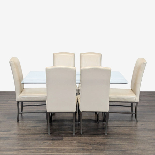 Reflections Furniture dining set with glass table, six cream chairs, and metal legs in a modern style.  