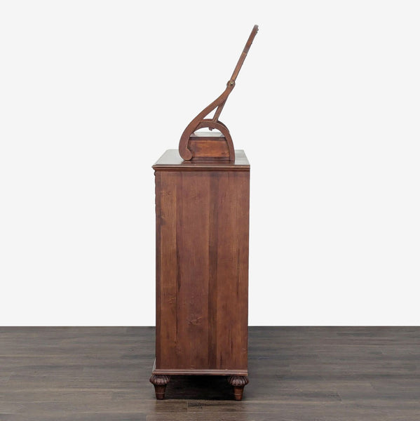 Ethan Allen dresser with attached mirror in classic style, wooden finish, and multiple drawers for storage.