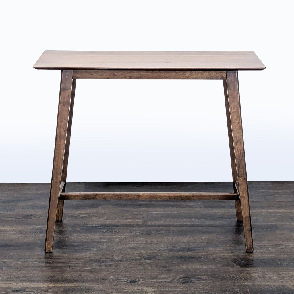 1. Noble House Home walnut dining table with splayed legs and elongated rectangular top.  